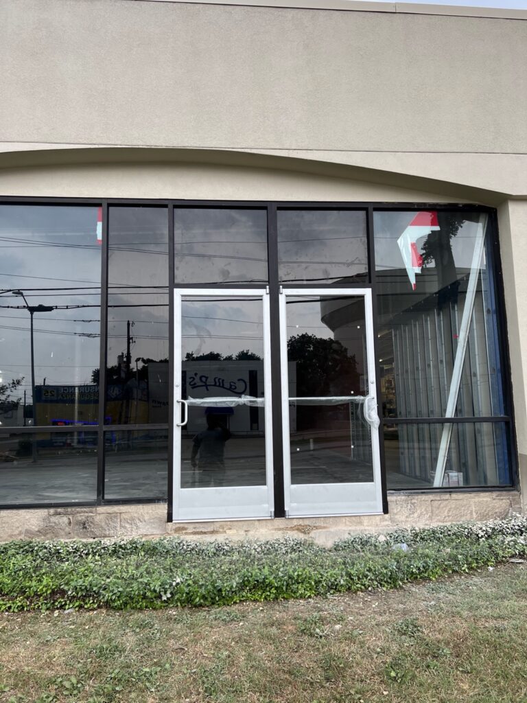 Commercial aluminum entrance and glass storefront
