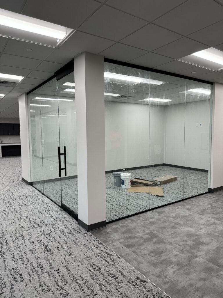 Full-height office glass partitions and frameless glass doors